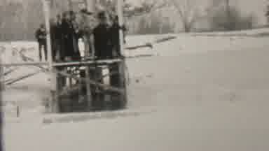 Albany New York USA (1937): Crowd Of People Standing On Dock Push One Person Into