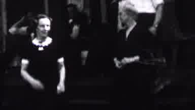 Albany New York USA (1937): Pipe Smoking Man In White Impresses Several Women