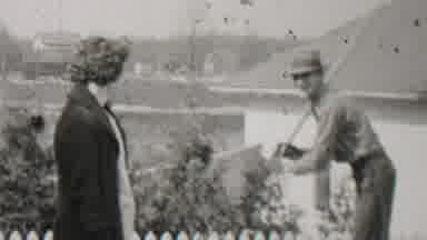Beachwood New Jersey USA (1937): Man Raises Rake To Female Companion In Stance To