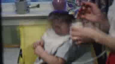 Des Moines Iowa USA (1959): Mom Feeding Baby Food With Spoon While Sitting