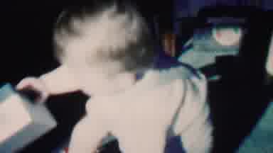 Des Moines Iowa USA (1959): Young Kid Discovers A Shoebox And Examines What It Is