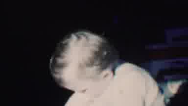 Des Moines Iowa USA (1959): Little Kid Moving With A Box Behind Him