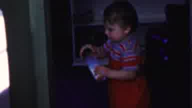 Des Moines Iowa USA (1959): Young Child Playing With His Bottle Of Milk