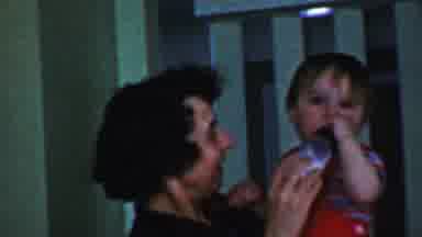 Des Moines Iowa USA (1959): Woman Feeding Bottle To Toddler