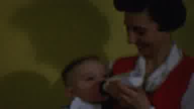 Des Moines Iowa USA (1959): Child Drinking From Bottle