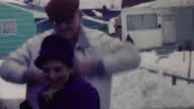 Grand Rapids Michigan USA (1958): People Putting On Jackets And Opening A Car Door
