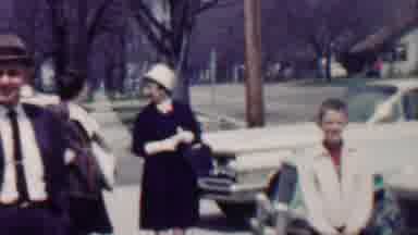 Grand Rapids Michigan USA (1958): People Drive Way Talking Mid Day 1950'S