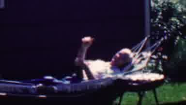 Grand Rapids Michigan USA (1958): Man Laying In Hammock Waving Fingers