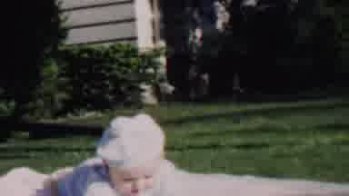 Lincoln Nebraska USA-1962: Woman And Baby Enjoying Sunny Day On Grass