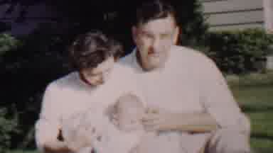 Lincoln Nebraska USA (1962): Parents With Infant Posing On Lawn