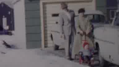 Lincoln Nebraska USA (1962): Family Pushing Child In Sled