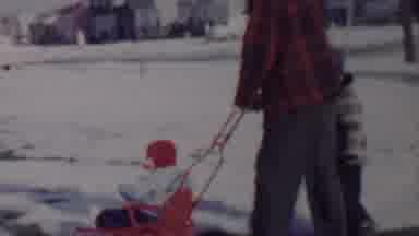 Lincoln Nebraska USA (1962): Man And Two Children Playing In The Snow.