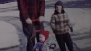 Lincoln Nebraska USA (1962): Man Pushing Stroller With Another Child In The Winter