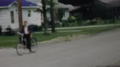 Louisiana USA (1959): A Boy Riding His Bicycle