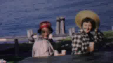 Louisiana USA (1959): Two Ladies Sitting By The Water Smile And Look In The Same