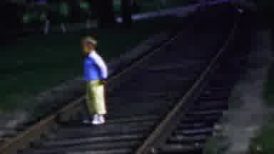 Louisiana USA (1959): Child On Railroad Tracks Before Storm