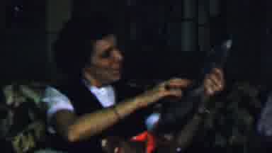 OMAHA NEBRASKA USA-1959: Woman Inspecting A Gift She Received