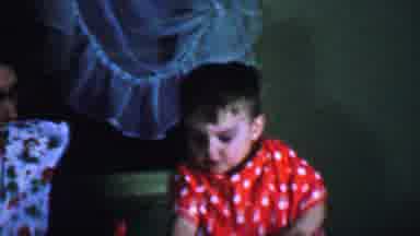 Omaha Nebraska USA (1959): Young Boy Playing With A Woman