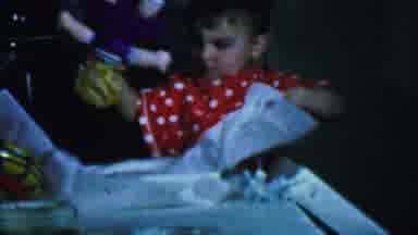 Omaha Nebraska USA (1959): Little Boy Opening Gifts For His Birthday