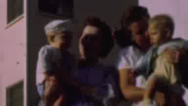 San Diego California USA-1961: Two Mothers Playing With Their Babies