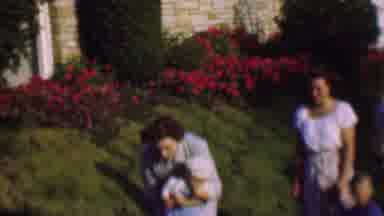 San Diego California USA (1961): Two Women, One Man All With A Small Child Walking