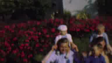 San Diego California USA (1961): A Woman And A Man Walking With Babies, Some Kids