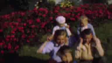 San Diego California USA (1961): Parents With Happy Children Playing In Home