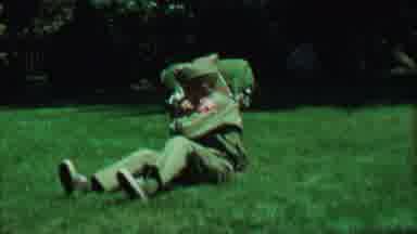 Farragut State Park Idaho USA-1967: Boy Scout Putting On Rucksack