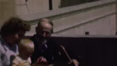 San Diego California USA (1961): Grandparents Show A Baby How To Strum A Banjo