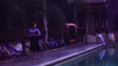 San Diego California USA (1961): Young Woman Walking Alongside A Large Elegant