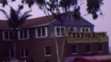 San Diego California USA (1961): A Banner On A Hotel Or Venue Welcomes Composer