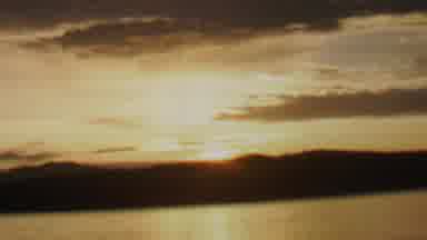 St Paul Minnesota USA (1962): The Sun Is Setting Behind The Mountain By The Lake