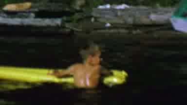 St Paul Minnesota USA (1962): A Boy Leans On A Yellow Floating Bed In A Pool