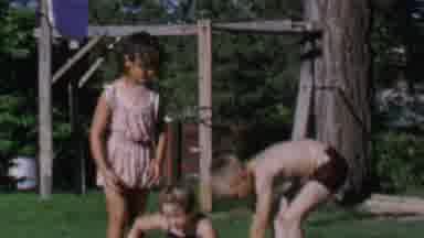 St Paul Minnesota USA (1962): Two Girls And One Boy Playing In Children's Pool