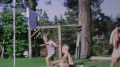 St Paul Minnesota USA (1962): Kids Playing Outside In Kiddie Pool Splashing Water