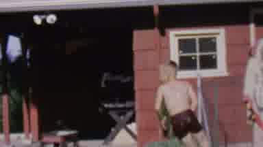 St Paul Minnesota USA (1962): Wet Boy Running In The Backyard And Playing With