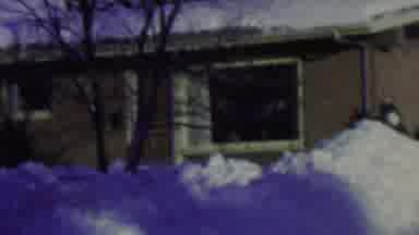 ST PAUL MINNESOTA USA-1962: Cold Winter Day With Snow Piles And A House