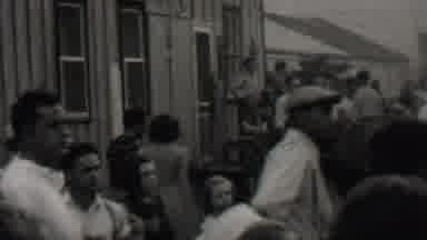 Trenton New Jersey USA (1937): Men Gathering Watching Race Car Speed Around Corner