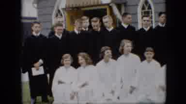 Pennsylvania (1957): Members Of A Choir Pose In Front Of A Church While Dressed In