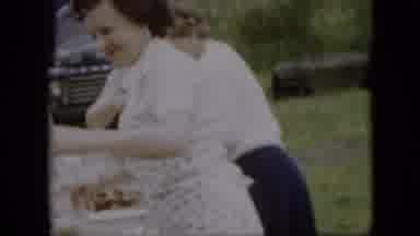 Pennsylvania (1957): Three Women Are Standing At Picnic Table Getting Food Ready