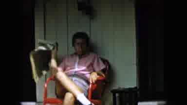 Pennsylvania (1957): Person Blowing Bubble Gum While Sitting In Chair