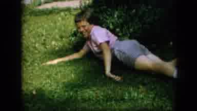Pennsylvania (1957): A Boy Rolling Around In The Grass And Laughing.
