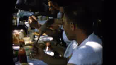 Pennsylvania (1957): People Eating A Feast Outdoors In A Backyard