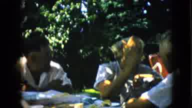 Pennsylvania (1957): Group Of People Sitting Around Table Outside Talking