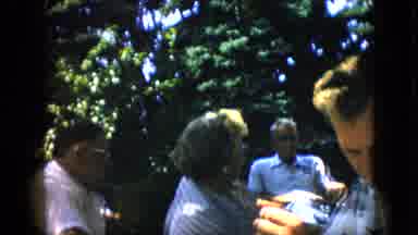Pennsylvania (1957): People Sitting Around Outside Eating Food And Talking