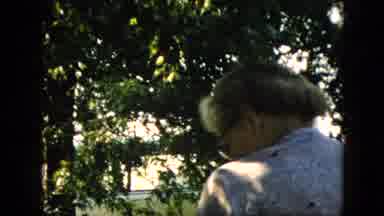 Pennsylvania (1957): Older Woman Near Trees With Other People