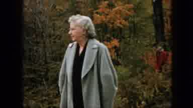 Pennsylvania (1957): Outdoor Fall Scene With An Older Woman Smiling In A Long
