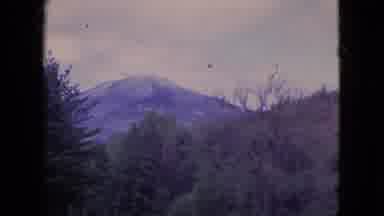 Niagra Falls New York (1964): A Scenic Vista Of A Snow-Capped High Hill With A