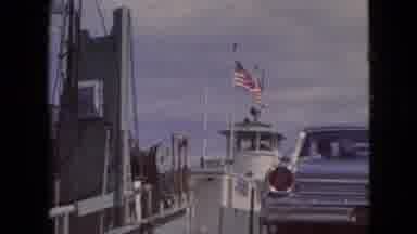 Niagra Falls New York (1964): A Car Drives Onto A Ferry Flying An American Flag On