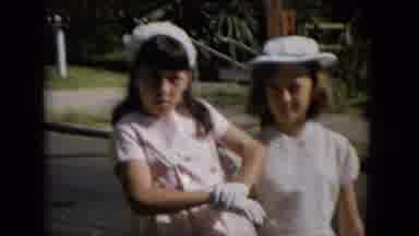 Hawaii (1965): Three Little Girls Standing Outside In Front Of A Bush Wearing